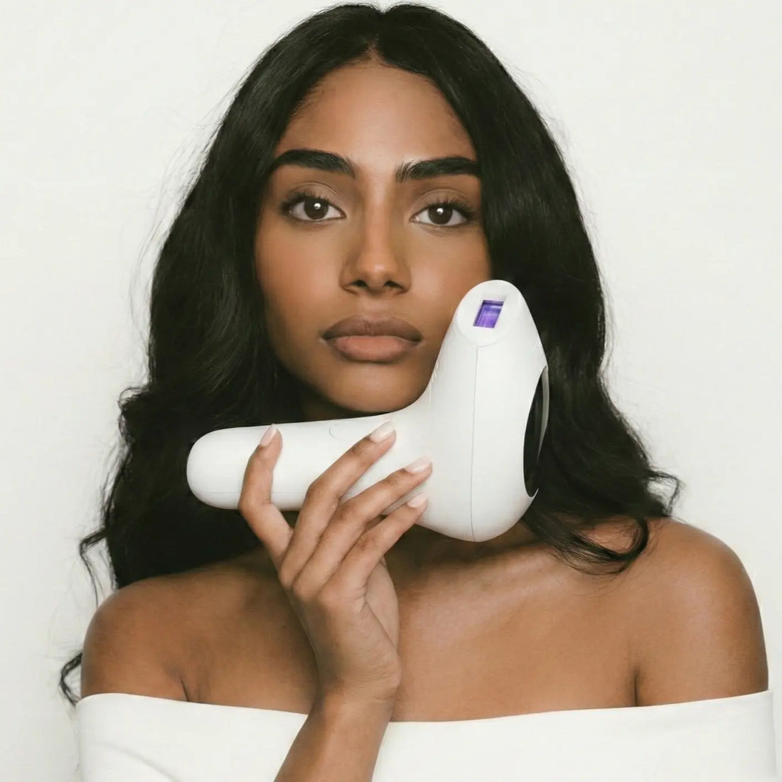 Pakistani woman using GlowPro IPL+ for facial hair removal - The GlowPro Guide for PCOS