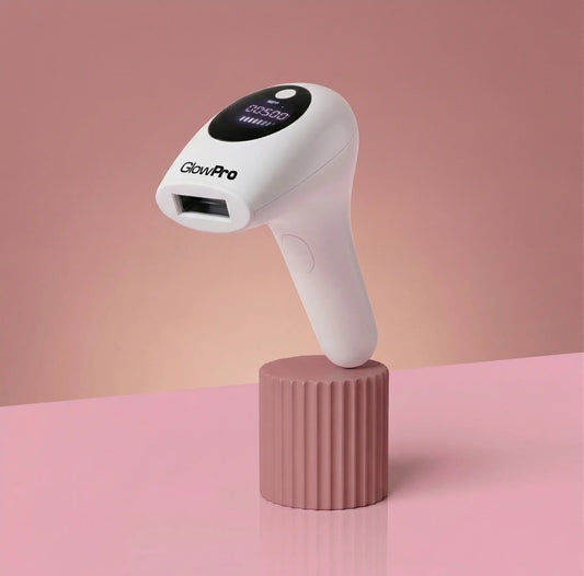 The premium GlowPro IPL+ at-home hair removal handset displayed elegantly on a pink stand, representing a smart one-time financial investment compared to expensive laser clinics in Pakistan.